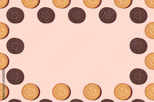 cookie frame. Cookies on a pink background. Flat lay. Sweet cookies flat lay pattern on light pink background. Top view.