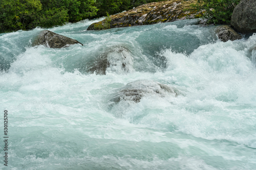 Blue spring water stream, Norway, Briksdal. National park Jostedalsbreen. Blue spring water stream, Norway, Briksdal. National park Jostedalsbreen.