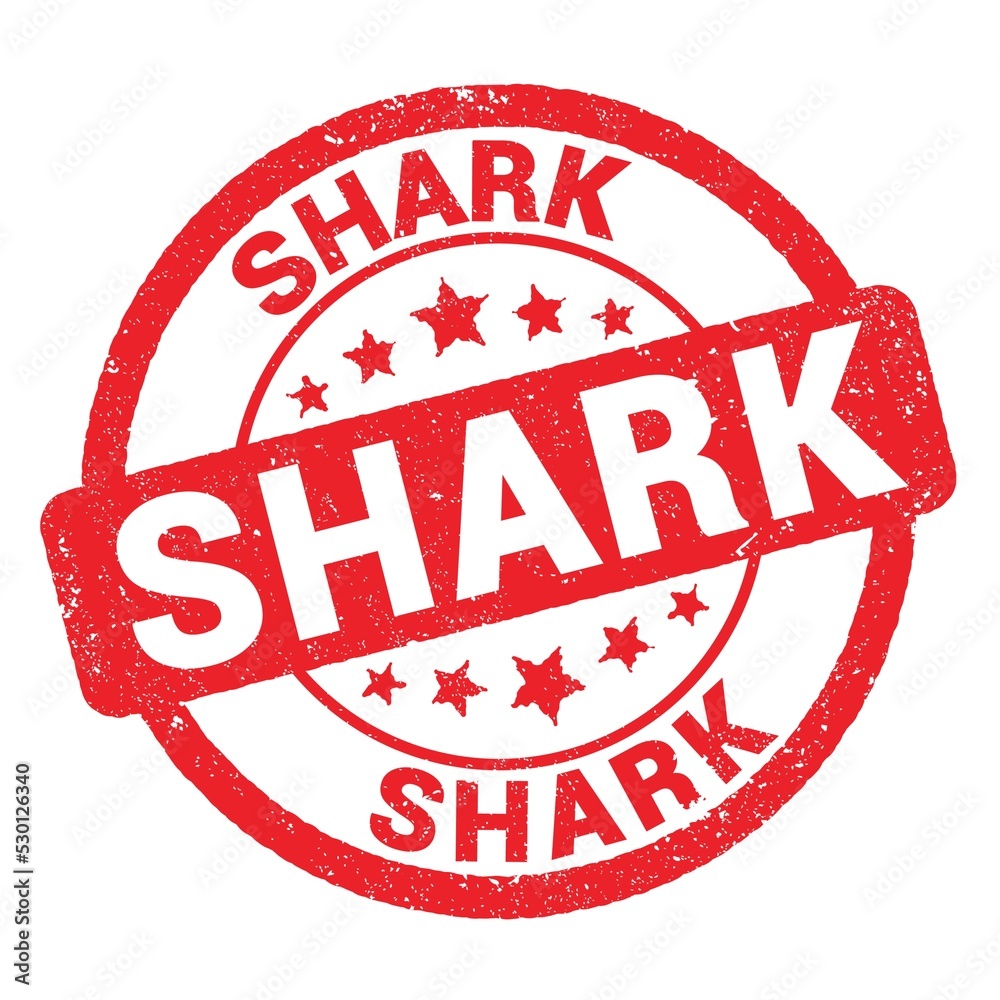 SHARK text written on red stamp sign. SHARK text written on red stamp sign.