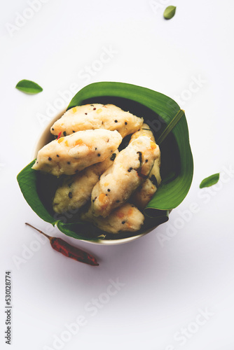 Kozhukatta Pidi is a steamed snack food from kerala rice flour with finger impressions photo