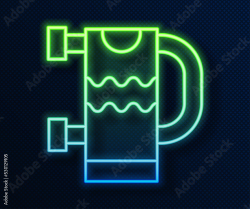 Glowing neon line Heated towel rail icon isolated on blue background. Vector