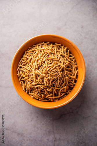 Nachni or Ragi Sev is a delicious crispy noodle made from finger millets, healthy Indian food photo