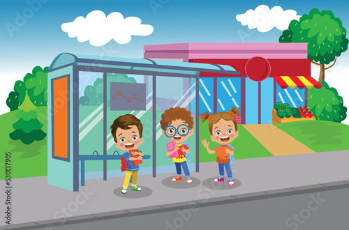 Happy Students Waiting For The Bus At The Bus Stop To Go To School