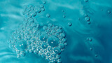 Cosmetic texture. Beautiful structure of cosmetic gel bubbles on turquoise background