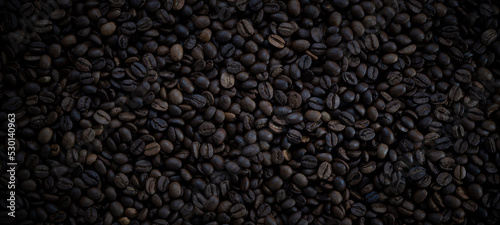 Billede på lærred Panoramic close-up texture of coffee beans. Hot drink background