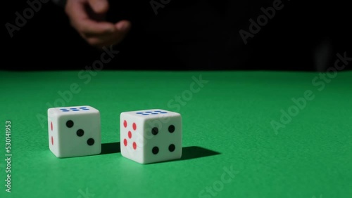 The hand throw the dice on the green game table. six six. Two sixes. Double. Twelve. White Dice Transition, devil's bones, Dice Transition, Casino dice, Falling Dice
