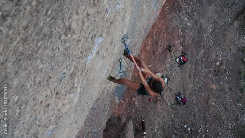 Female climber going her way up the rope after having a big fall in Sant Llorenç del Munt y l'Obac Natural Park, Catalonia, Spain.
Following camera movement, low angle, 4K. photo