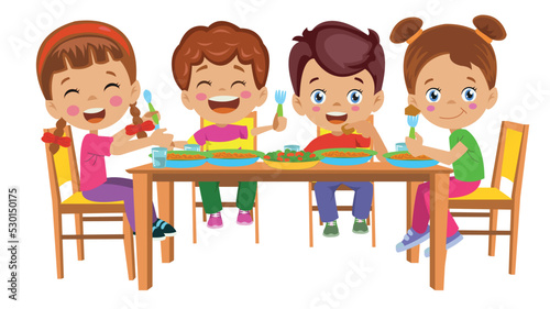 cute kids eating at the dinner table