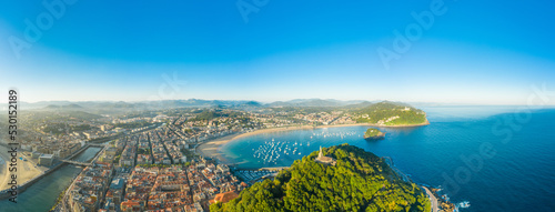 Fantastic aerial perspective of Donostia - San Sebastian city. View of the statue of 