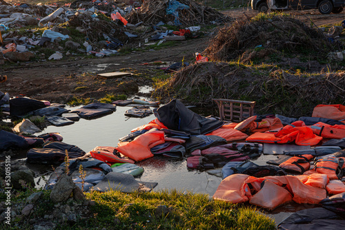 Fototapeta Naklejka Na Ścianę i Meble -  refugee lifejacket in water