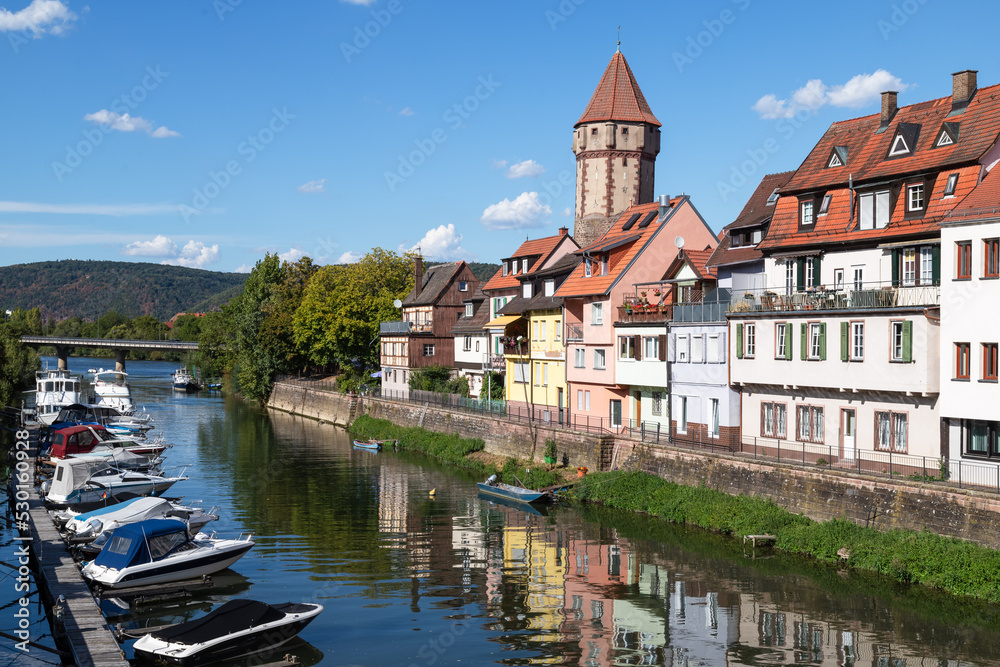 Obraz premium Monumental old watchtower along the river Tauber in the small town of Wertheim in Bavaria, Germany