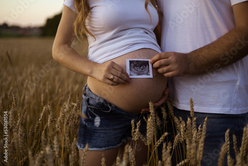 a family of two waiting for baby
