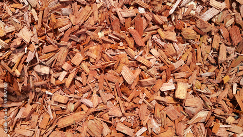 Natural background of red mulch, close up photo