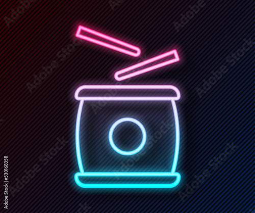 Glowing neon line Chinese drum icon isolated on black background. Traditional asian percussion instrument Taiko or O-Daiko drum. Vector