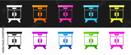 Set Furniture nightstand icon isolated on black and white background. Vector