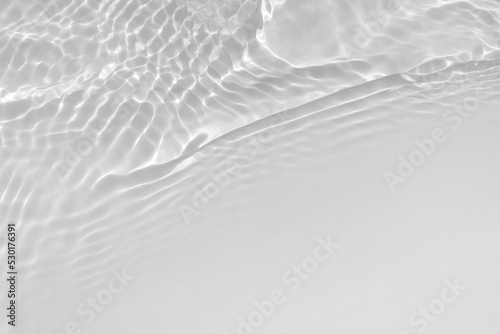 Water texture with wave sun reflections on the water overlay effect for photo or mockup. Organic light gray drop shadow caustic effect with wave refraction of light. Banner with copy space.