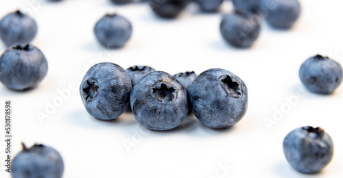 Close-up of freshly picked blueberries on a white background. Healthy Eating.