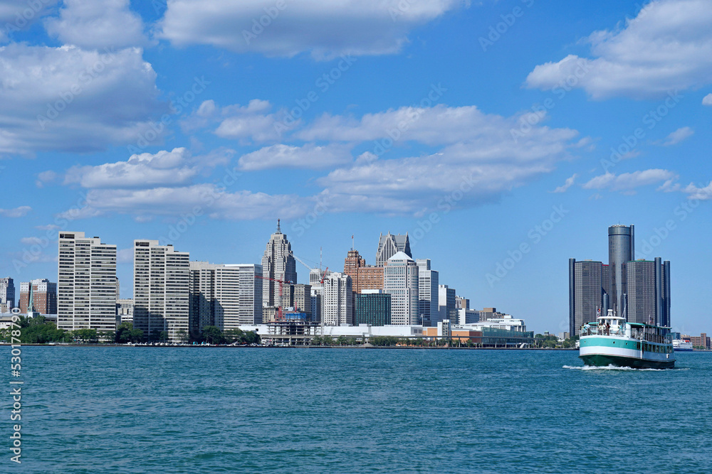 Detroit downtown skyline and waterfront viewed from across the river Detroit downtown skyline and waterfront viewed from across the river
