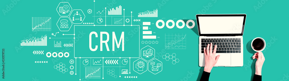 CRM - Customer Relationship Management theme with person using a laptop computer CRM - Customer Relationship Management theme with person using a laptop computer