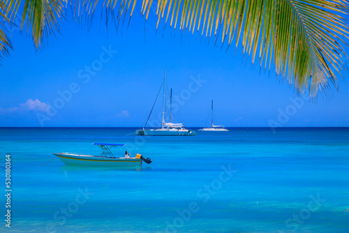 Tropical idyllic caribbean beach with sailboats  Punta Cana  Dominican Republic