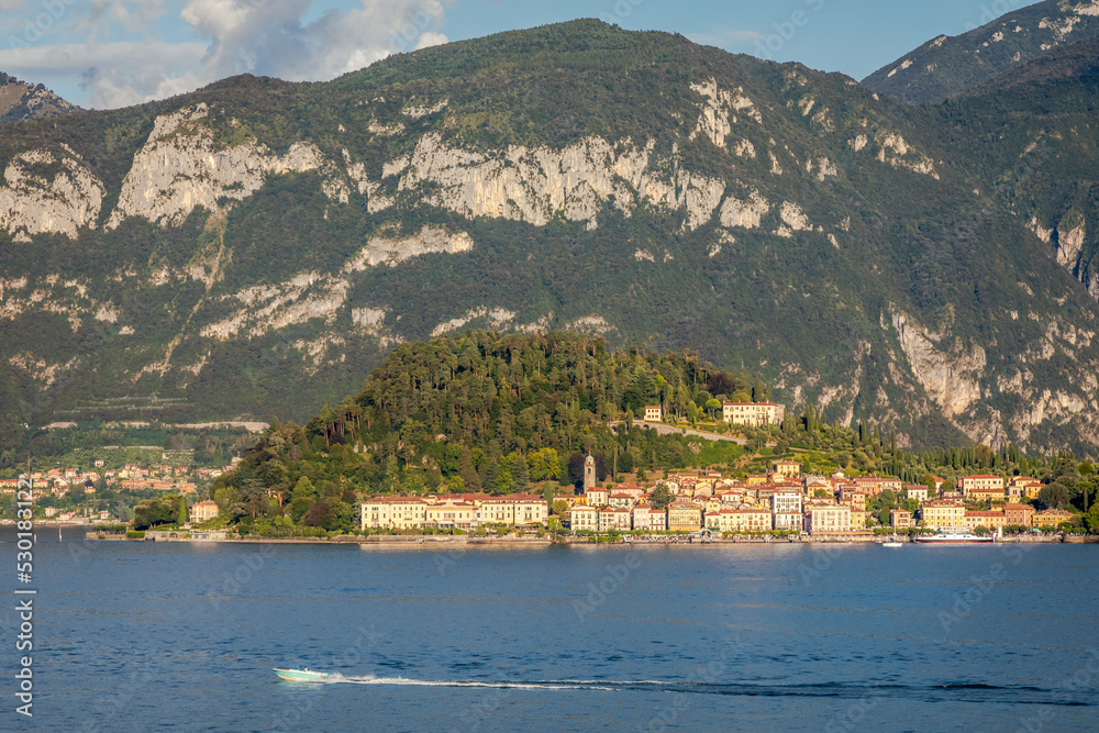 Obraz premium Mountain and Bellagio skyline view from Lake Como at sunset, northern Italy