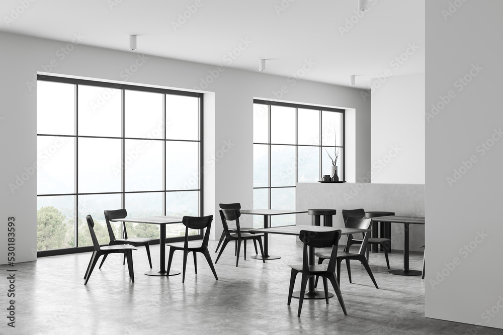 Fototapeta premium Corner view on modern bright cafe interior with four tables