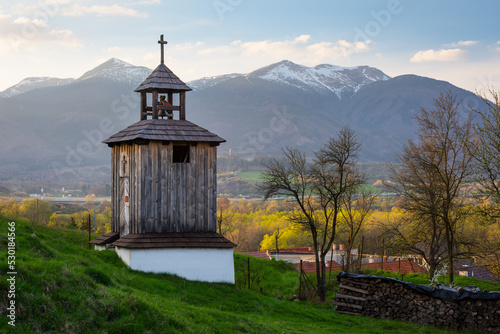 Historical bell tower in Nolcovo village, Slovakia. photo