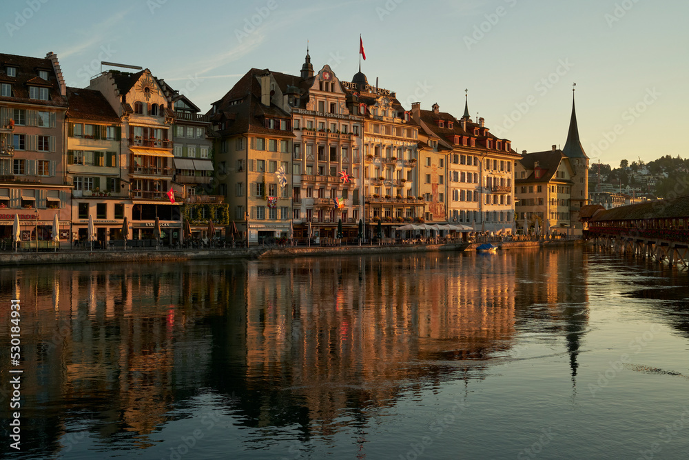 Old buildings facades at riverside in Switzerland