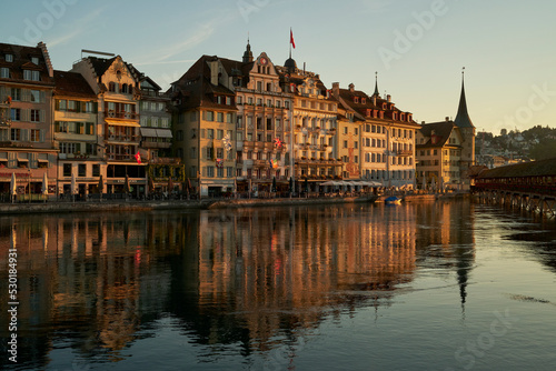 Old buildings facades at riverside in Switzerland