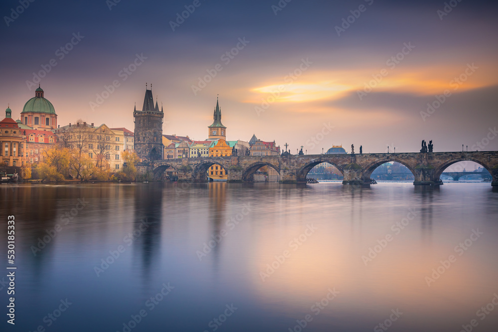 Fototapeta premium Charles bridge at sunset, peaceful medieval Prague, Czech Republic