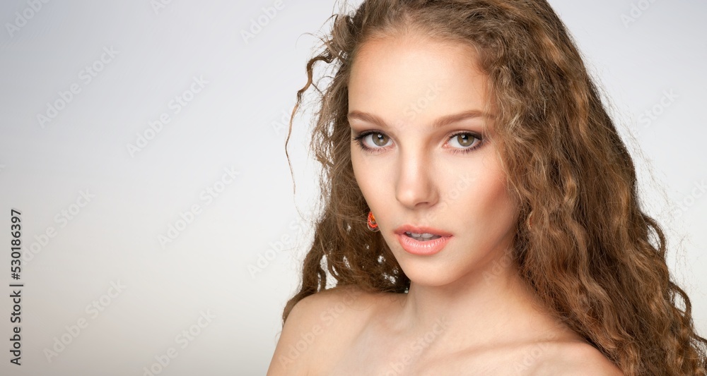 Naklejka premium Beautiful young woman with clean fresh skin. Face care concept.