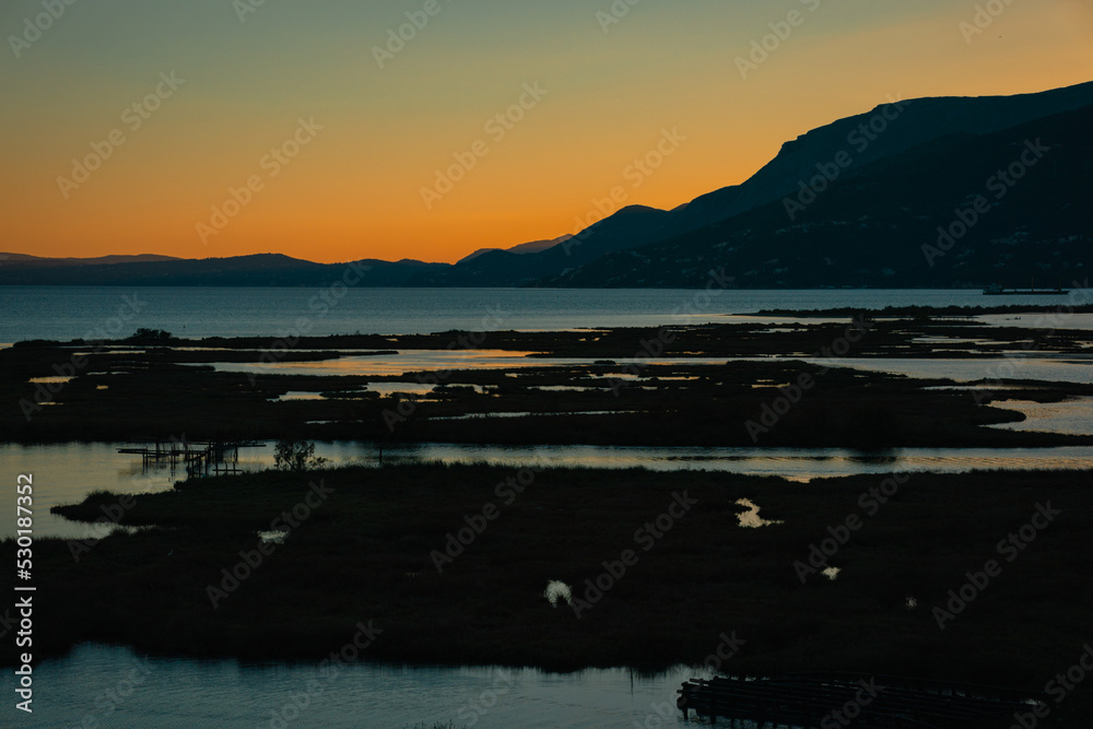 Obraz premium Sunset on Lake Butrint, Albania