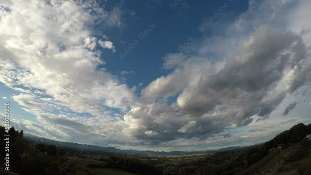 white clouds are floating in the sky, thereby covering the shot at about 300 meters in height, late summer, early afternoon, central Europe, hilly area white clouds are floating in the sky, thereby covering the shot at about 300 meters in height, late summer, early afternoon, central Europe, hilly area