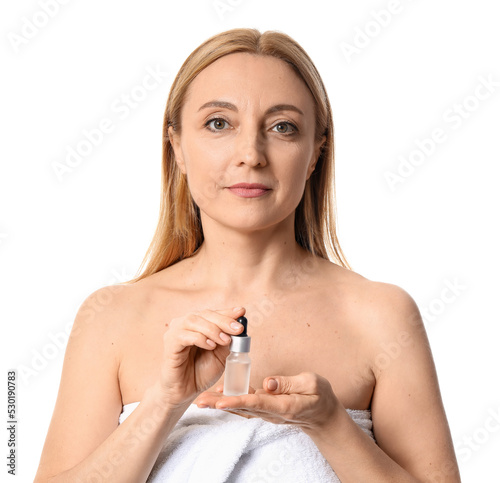 Mature woman with cosmetic ...
