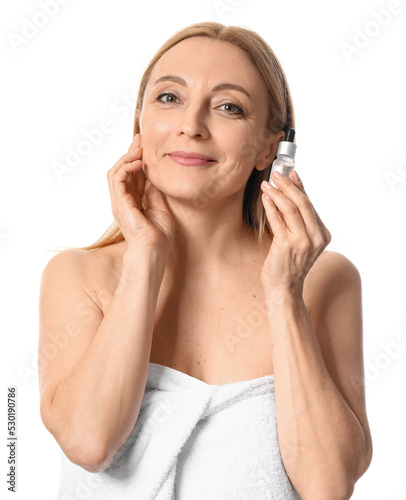 Mature woman with cosmetic ...