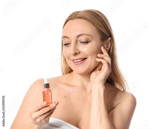 Mature woman with cosmetic ...