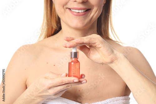 Mature woman with cosmetic ...