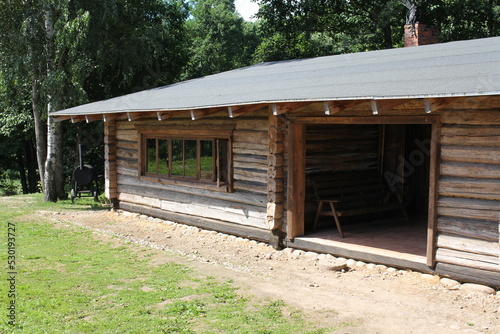 Wooden building for children. Tree house. Games with a child. Vacation for the whole family.