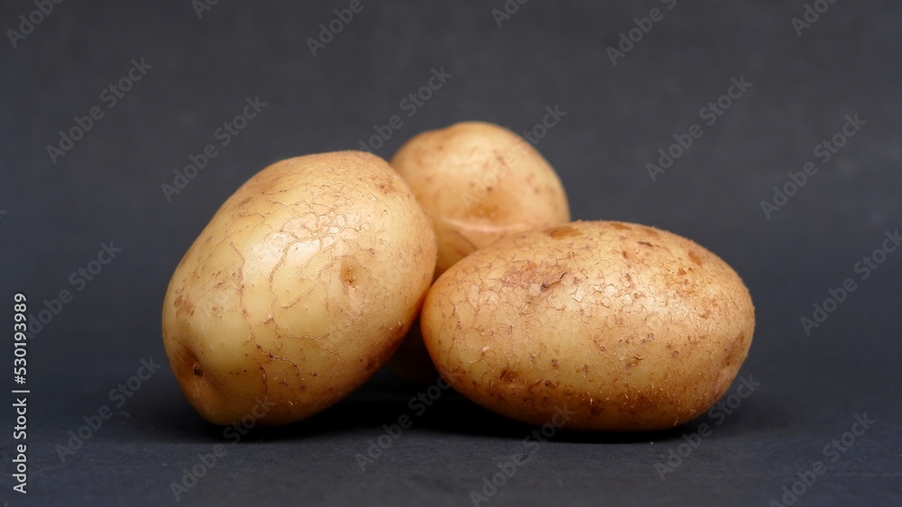 Fototapeta premium Fresh raw Potato on isolated background