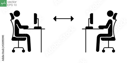New normal concept in work office desk icon. Two people working, sit at their desk with a computer. Keep social distance in work place in covid19 pandemic. Glyph style. vector illustration. EPS 10
