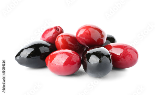 Heap of black and red olives on white background