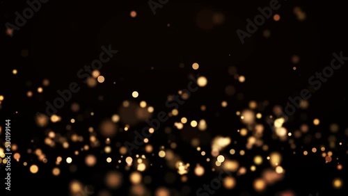 金のキラキラのパーティクル背景