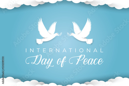 International day of peace background design with flying doves and clouds in the sky photo