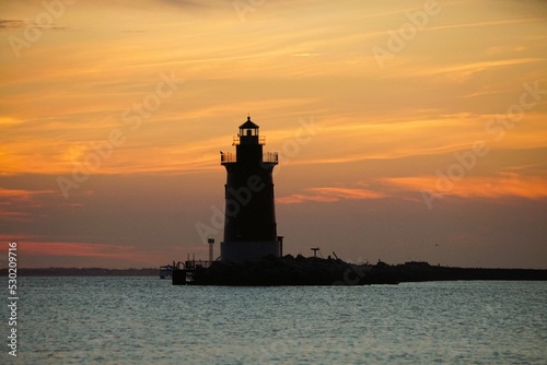 Silhouette of the lighthouse during sunset near Cape Henlopen State Park, Lewes, Delaware, U.S.A
