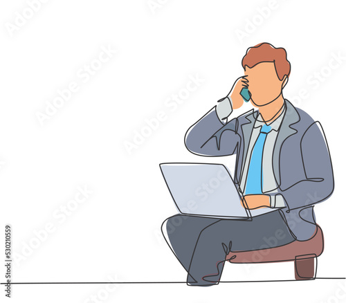 Single continuous line drawing of young manager sitting and typing on laptop during calling his team member to give instruction. Work direction concept one line draw graphic design vector illustration © Simple Line