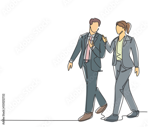 One single line drawing of young couple male and female employees discussing new strategy plan to write annual report. Urban commuter workers concept continuous line draw design vector illustration