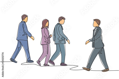 One single line drawing of young businessmen and businesswoman walking together on city street to go to the office. Urban commuter workers concept continuous line draw design vector illustration
