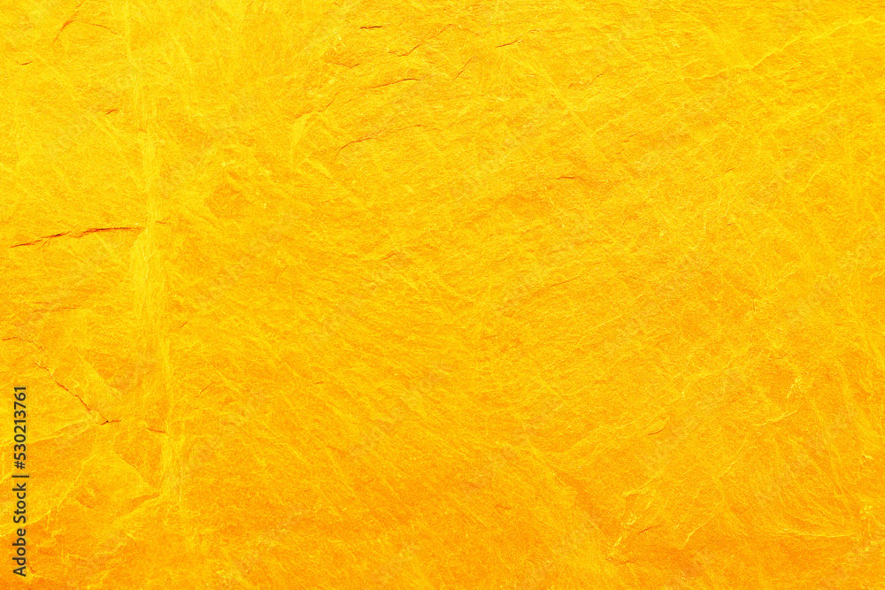 Fototapeta premium gold slate stone background or texture. gold stone