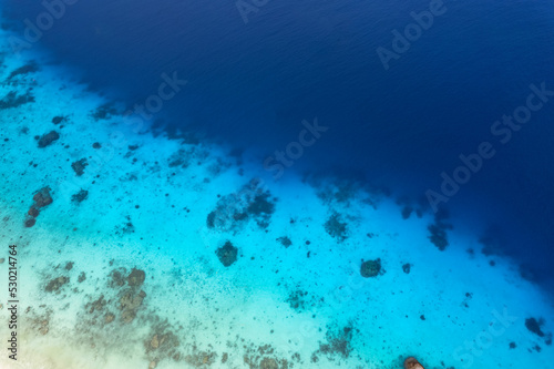 Sunny aerial view and aerial photographs of the beautiful tropical paradise beach of the Andaman Sea. amazing view Beach, turquoise water and coral amazing under the sea.soft focus