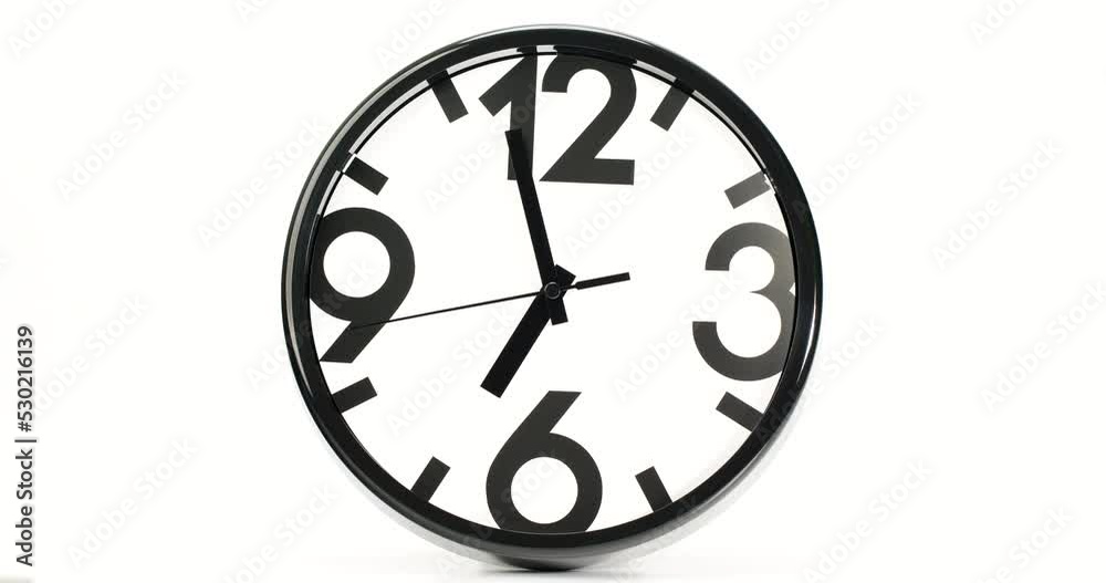 Close-up of a black watch with white dial, second hand running around the dial. Close-up of a black watch with white dial, second hand running around the dial.